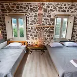 Вилла Stonevillamouzaki Luxury Mansion *